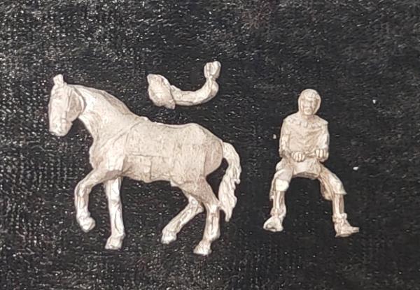 Reiter mit Pferd und Satteltaschen